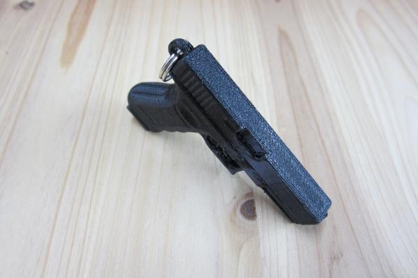 Schlüsselanhänger Pistole